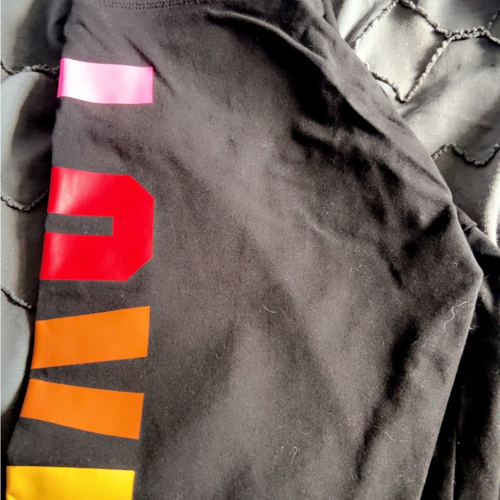 Victoria's Secret Black Leggings with Pink, Red, and Orange Accents